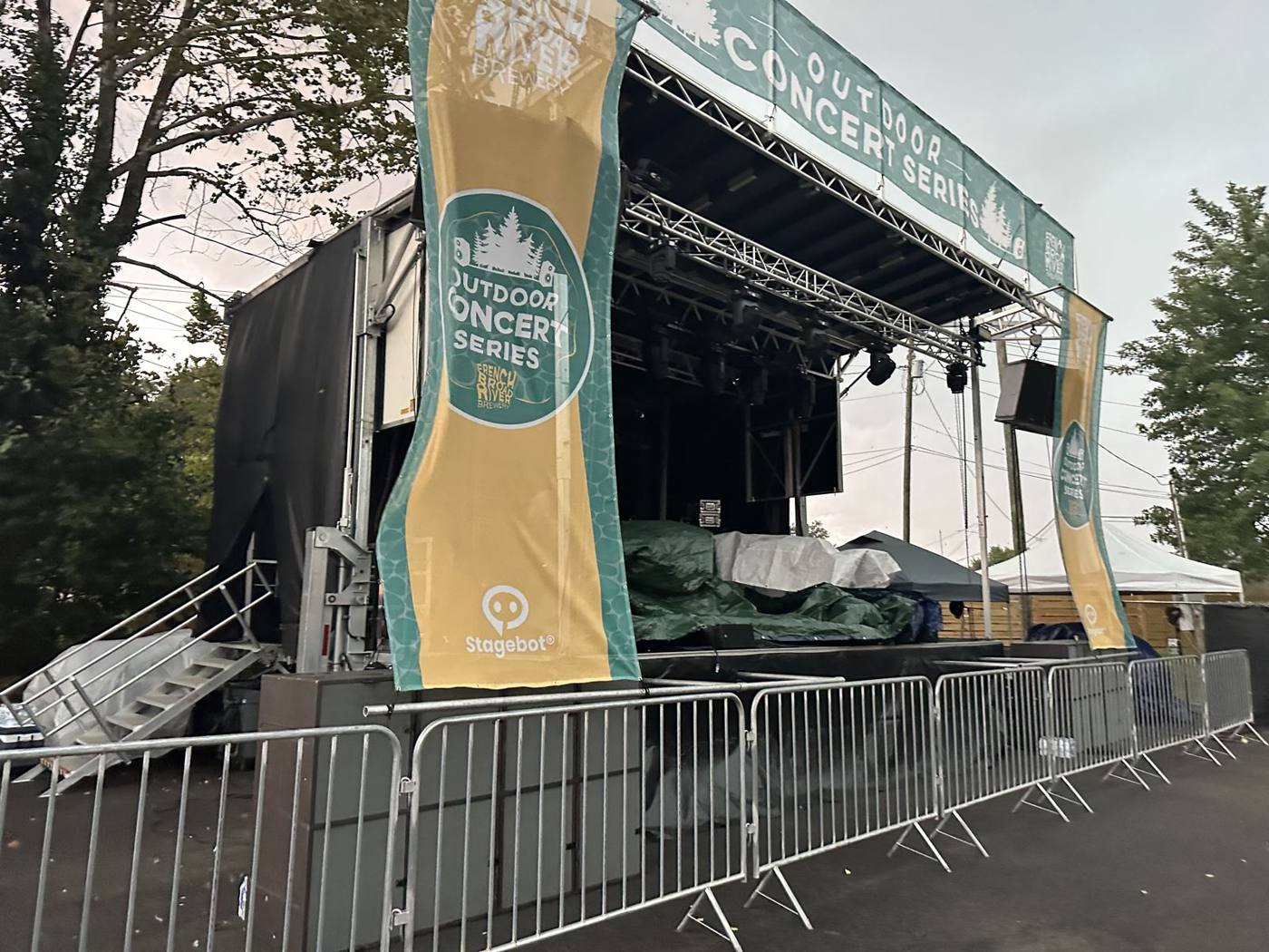 SL100 with storm prep under way before a show